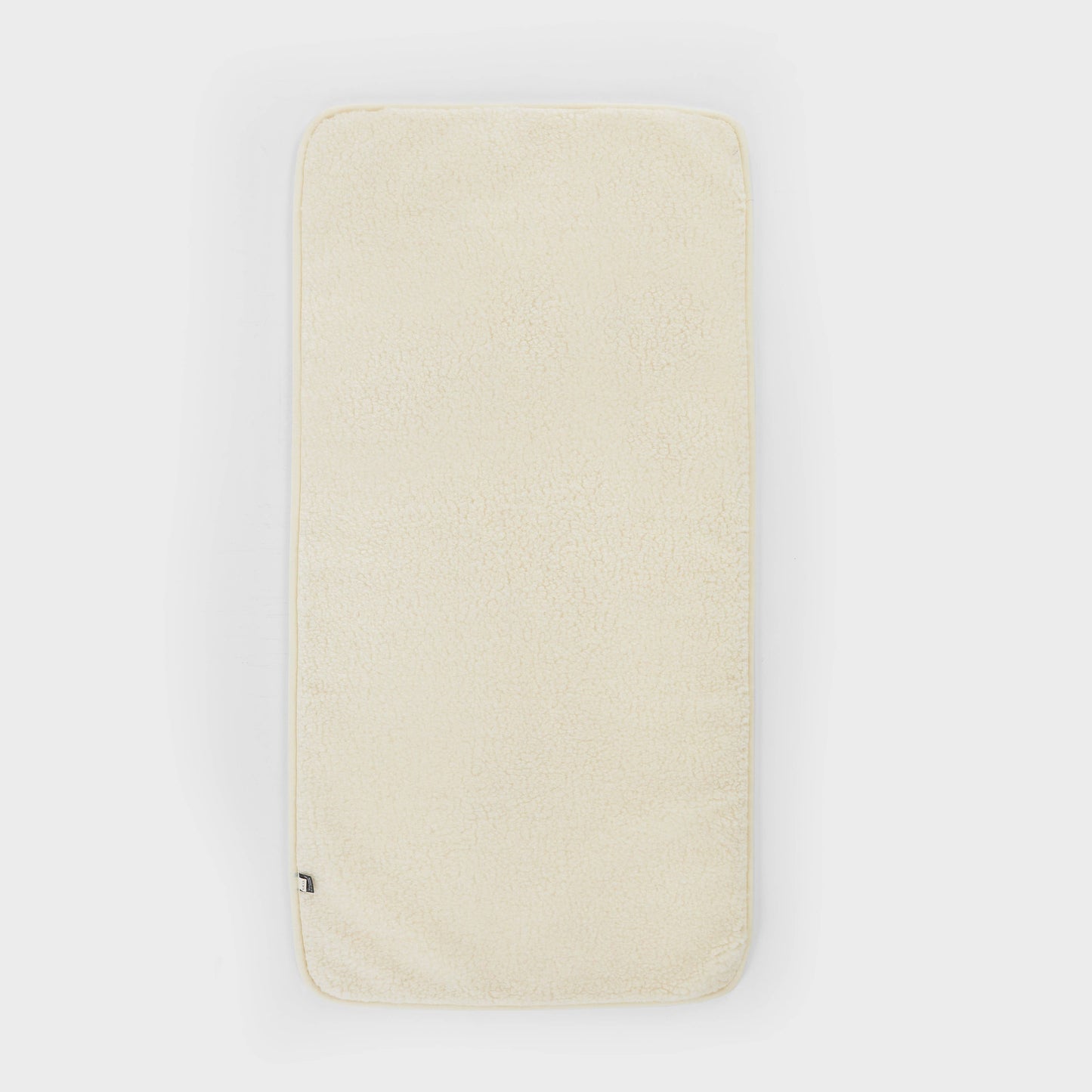 Onderlegger voor ledikant - 60x120cm - Merinowol - Naturel - Kico label
