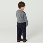 Pull en maille à carreaux - Pull Argyle - Laine d'agneau - Couleurs de Copenhague - Dos d'un enfant portant un pantalon long