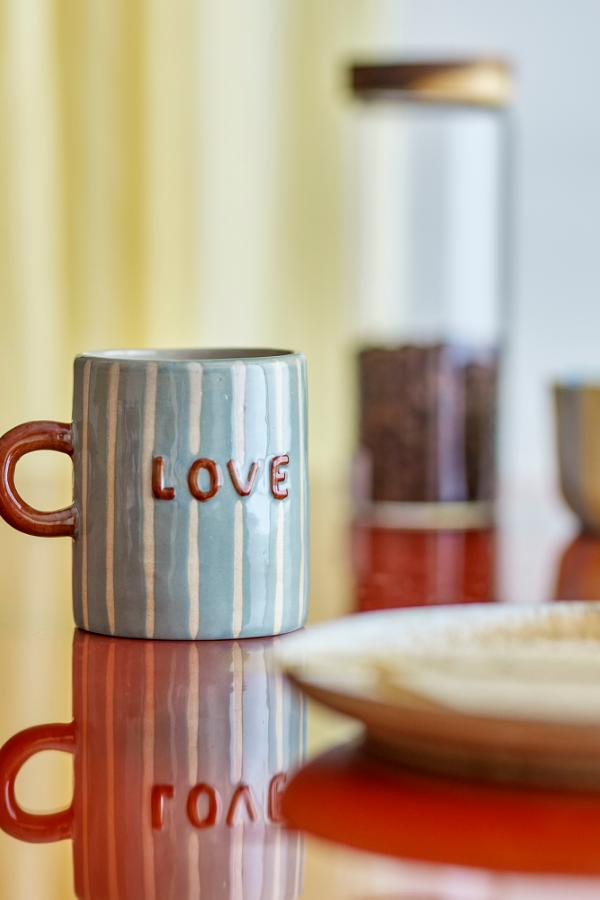 Cherish Mug Blue – Hand-painted ceramic mug with Dad – Bloomingville: blue mug on a table with the word Love.