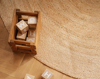 Moonboon - Jute kleed - 150 cm rond op de grond met blokken