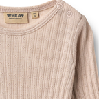 Wol-zijde romper Liea - Pale Lilac - Merino wol en zijde - Wheat close up